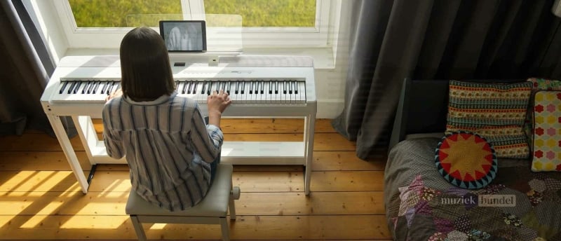 Gedetailleerde gebruikerservaringen en feedback over de Kawai ES520 digitale piano, inclusief prestaties en functionaliteit