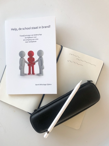 Help, de school staat in brand