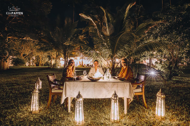 Private dinner setup on villa terrace during golden hour