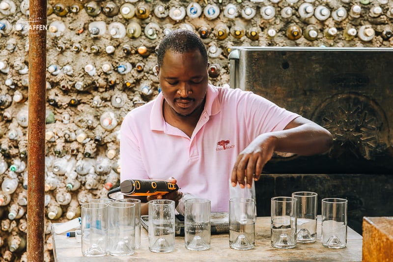 repurposing water bottles making them into drinking glasses for Nomad Beach Resort