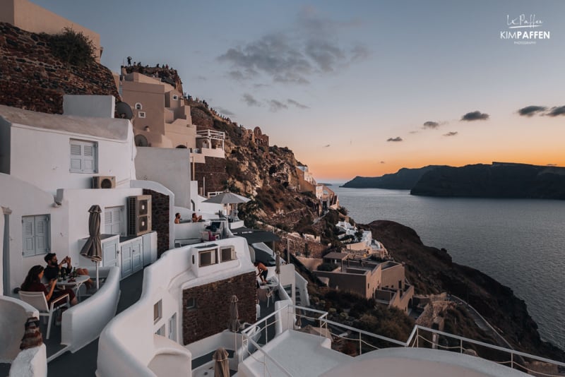 Busy sunset viewpoint at the castle of Oia Santorini