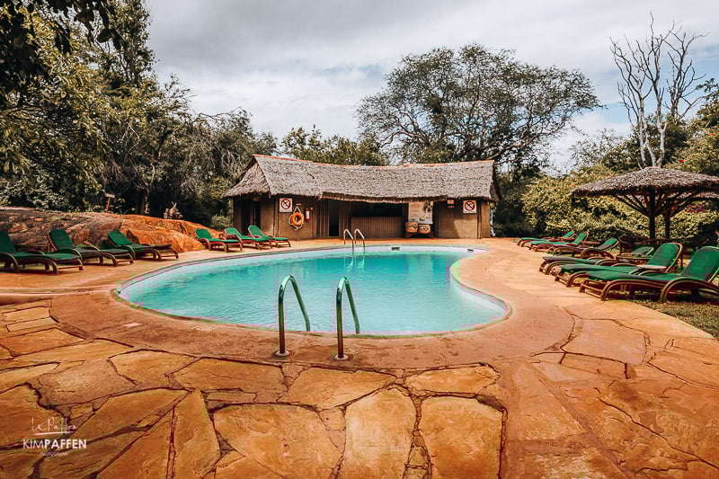 swimming pool with sun loungers at Serena Kilaguni Safari Lodge in Tsavo West Kenya
