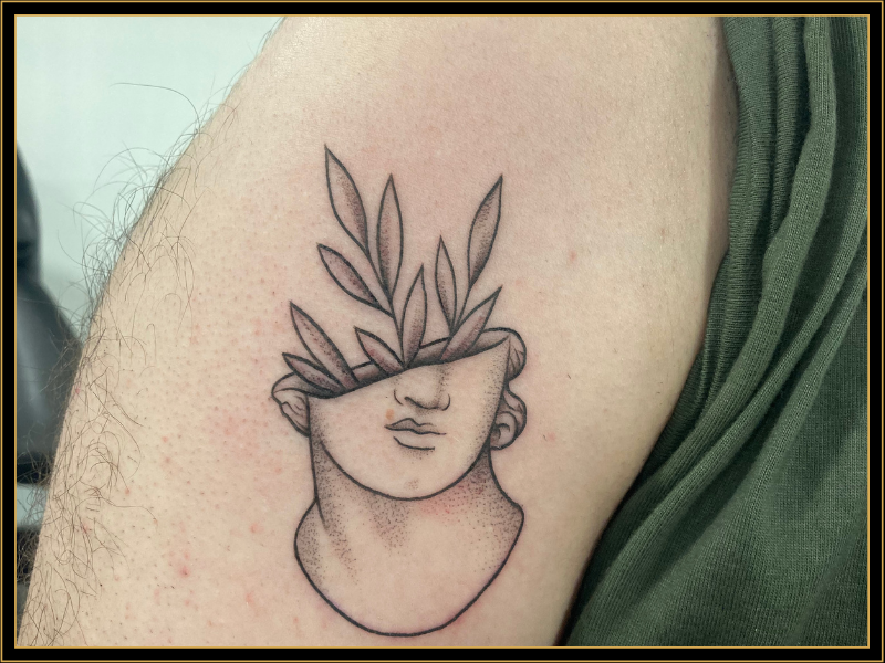 Face and Flowers Tattoo