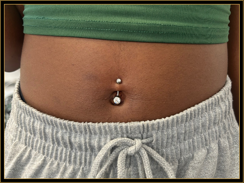 Atelier Pax Tattoo Belly Button piercing