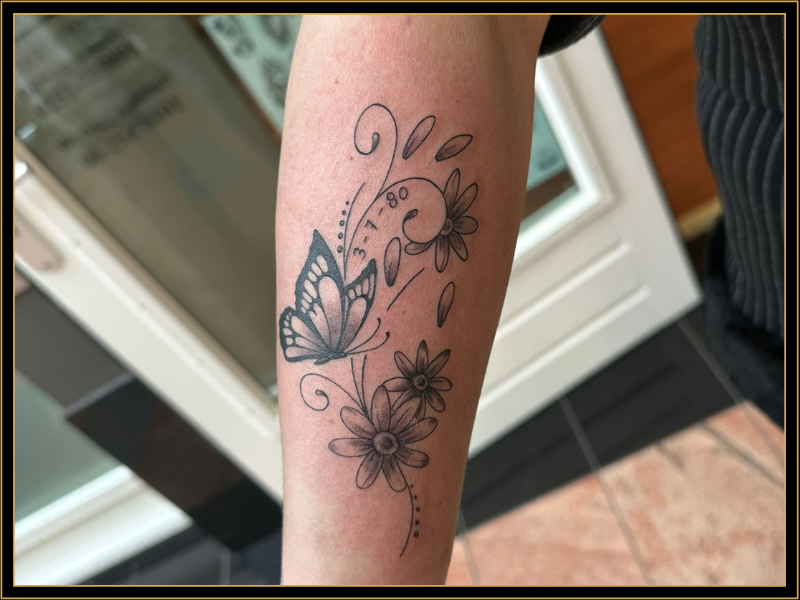 Butterfly and flowers fine line Tattoo