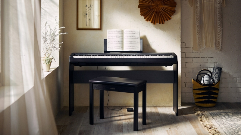 Een digitale piano met 88 gewogen toetsen is een goed alternatief voor een akoestische piano
