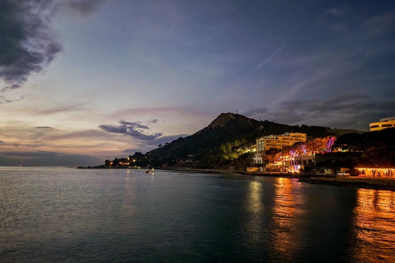 Currila Beach in Durrës, Albania with the Adriatic coastline, beachfront restaurants and promenade, featured in our Durrës City Guide.