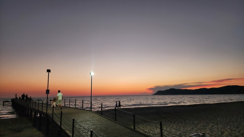 Gjiri i Lalzit near Durrës, Albania, featuring a wide sandy beach, crystal-clear Adriatic waters and a peaceful coastal landscape. Featured in the Durrës City Guide.