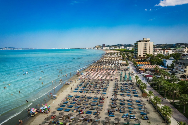 Golem Beach near Durrës, Albania, featuring a long sandy coastline, Adriatic Sea and beachfront resorts.