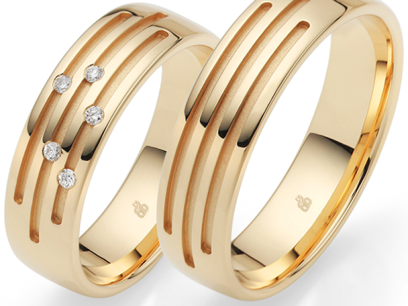 gouden design trouwringen met diamanten rauschmayer