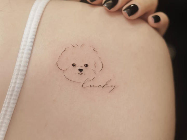 fine line Tattoo dog on shoulder