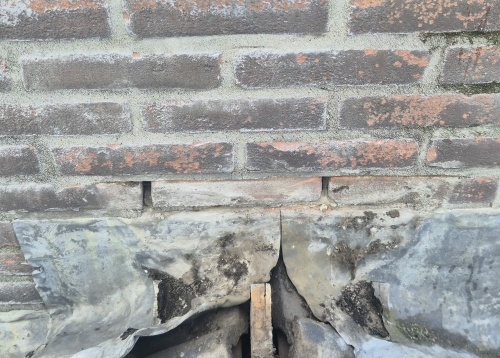 Schoorsteen inspectie - Lekkage loodwerk