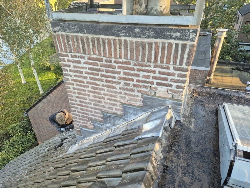 Schoorsteen loodslabben lekkage oplossen