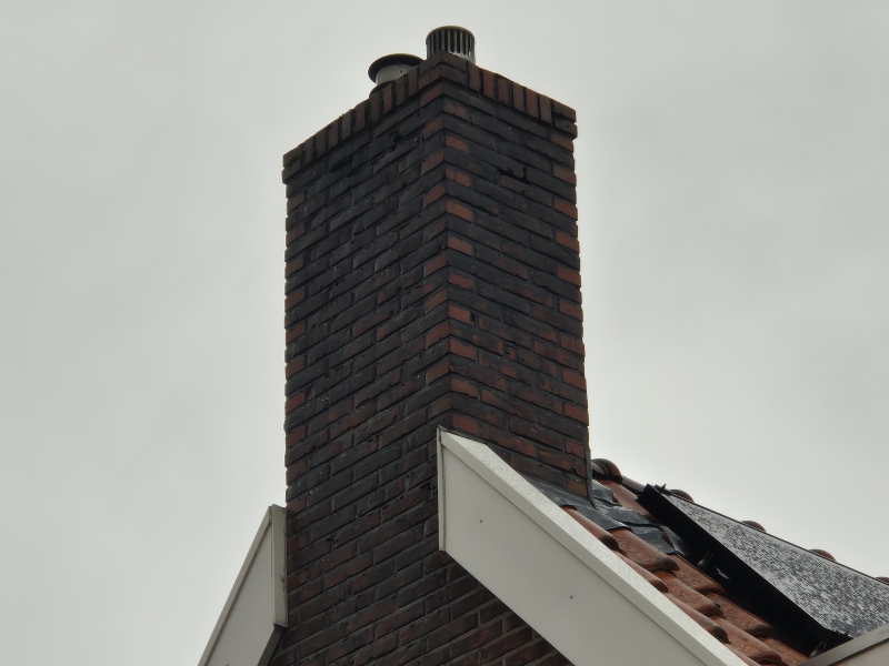Schoorsteen loodwerk inspecteren