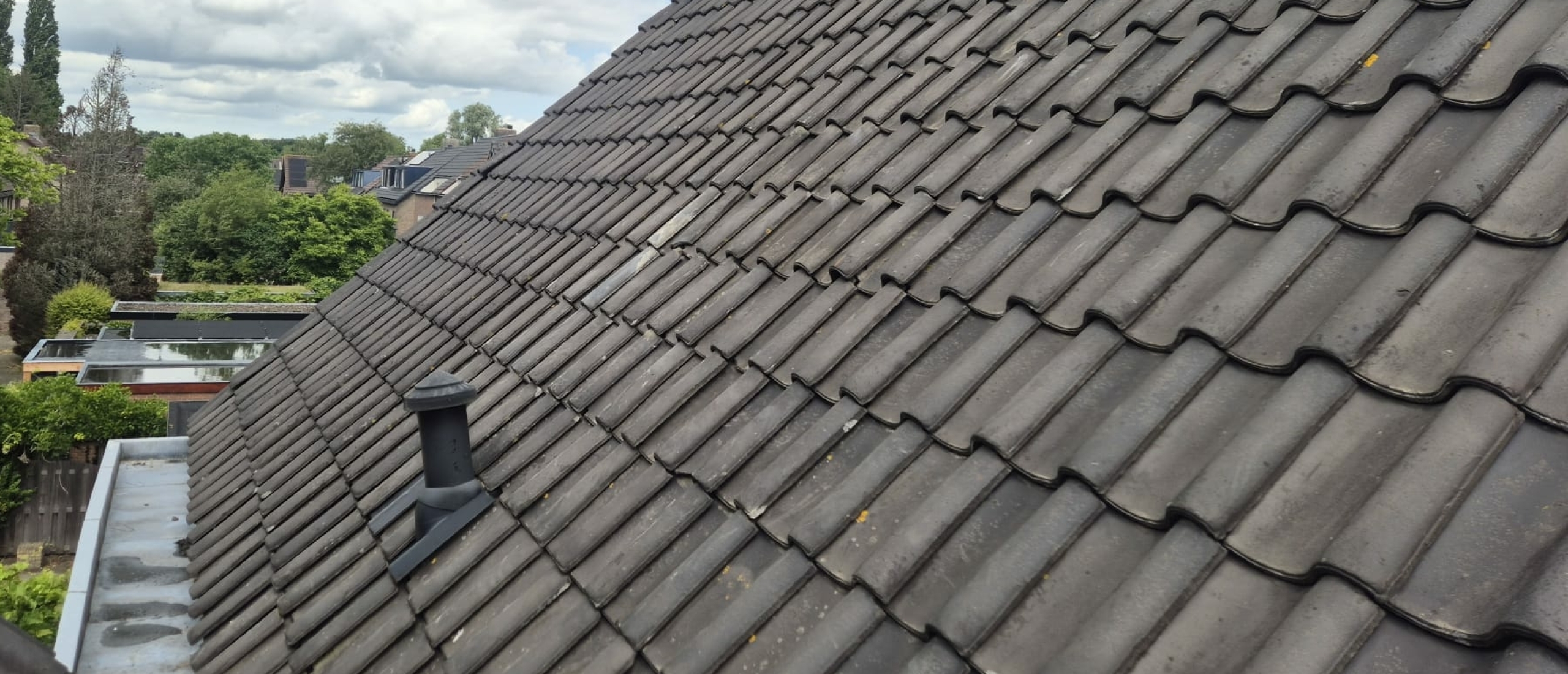 Schoorsteen verwijderen die niet meer in gebruik is