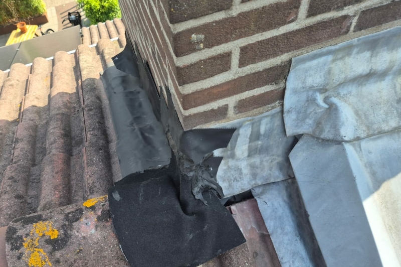 Schoorsteen gat bij het loodevervanger