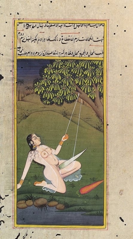 A woman using a dildo in the form of a root vegetable suspended from the branch of a tree.