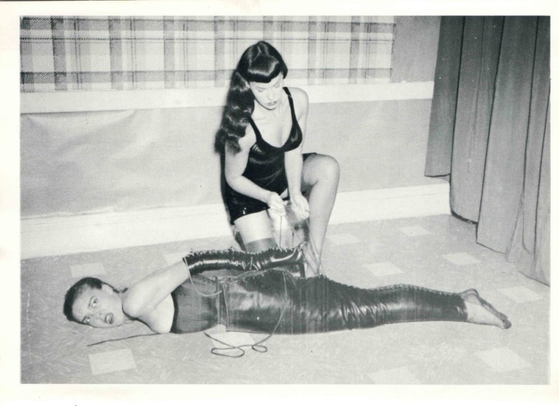 betty page tied down on the floor