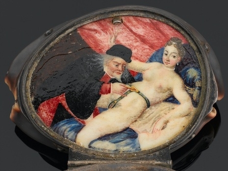 Early watch with illustration of couple using chastity belt Early watch with illustration of couple using chastity belt
