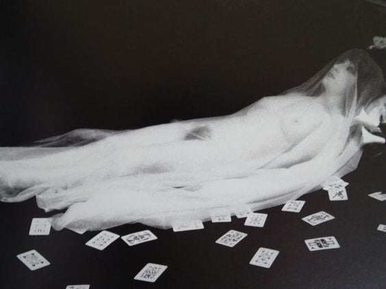 Irina Ionesco lying nude