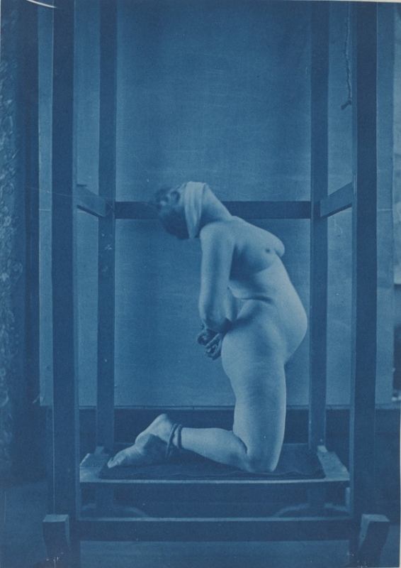 jeandel Tied woman inside the wooden construction