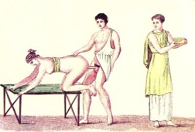 Man copulating with a woman from the rear while the boy is watching