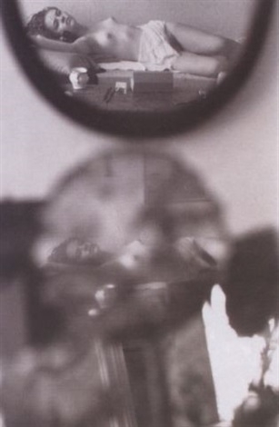 Nude in bed reflected in mirrors by Saul Leiter