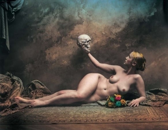 nude reclining female holding a skull Jan Saudek