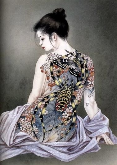 Ozuma kaname: sitting female with spider tattoo on her back