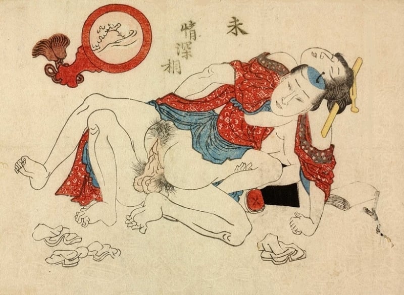 'Passionate intimate couple surrounded by paper tissues. The insert is a mirror depicting the insides of the vagina.' (c.1830) by a member of the Utagawa school 'Passionate intimate couple surrounded by paper tissues. The insert is a mirror depicting the insides of the vagina.' (c.1830) by a member of the Utagawa school