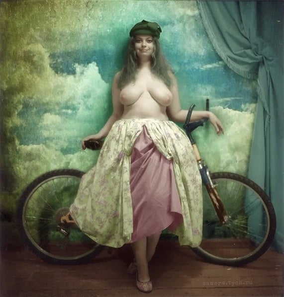 semi nude woman with bike by Andry A Tych