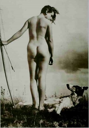 standing nude with dog