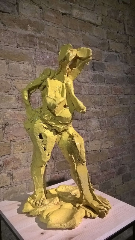 yellow statue nude female