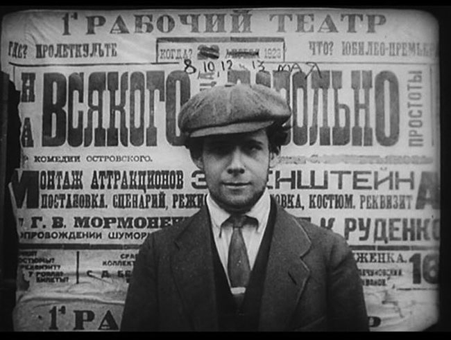 Young Eisenstein with the poster of his staging debut of Ostrovsky’s play Enough Stupidity in Every Wise Man