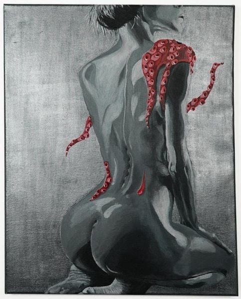 Nude female from the back with red tentacles over her shoulders