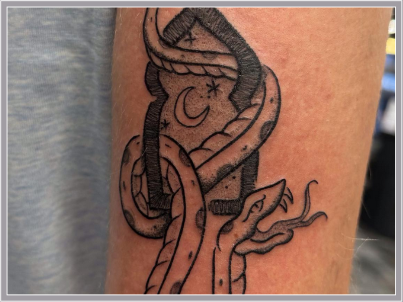 mysterious snake tattoo