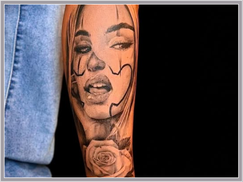 womans face tattoo