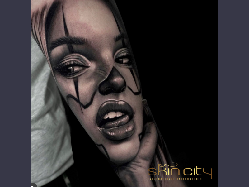 skincity clown lady tattoo