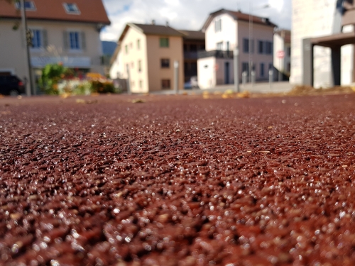 Coloured red asphalt close-up