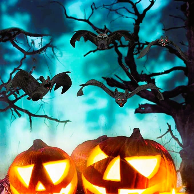 Vleermuis bij een lamp verschijning in huis als spiritueel teken