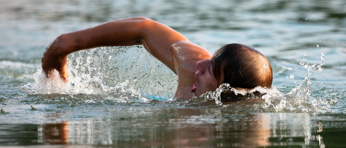 Wat is open water zwemmen? Welke kleding wordt er gedragen?