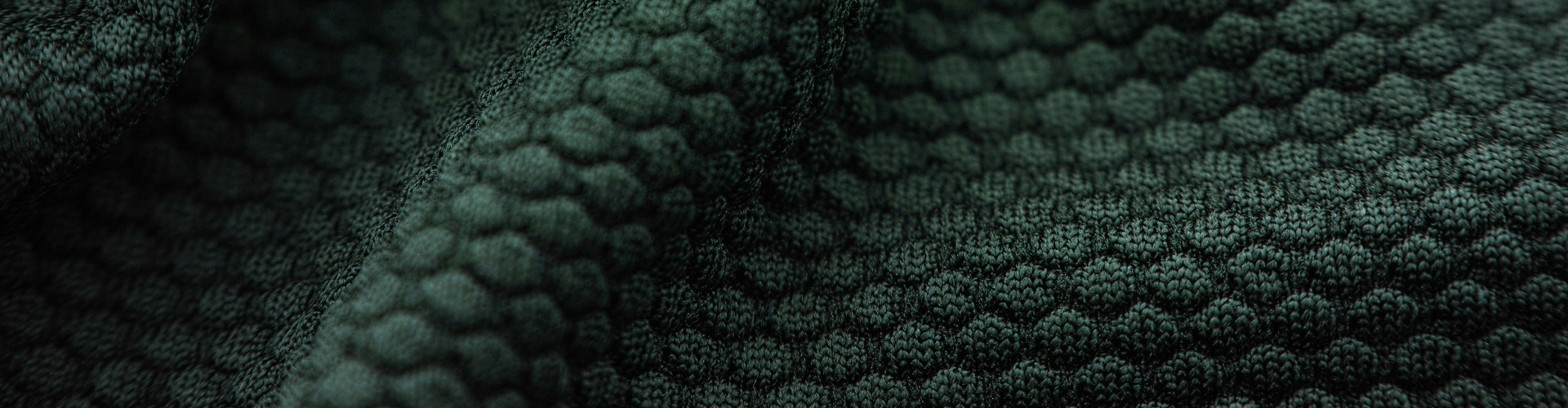 Achtergrond Styled by Debby groene stof met ingebreid patroon