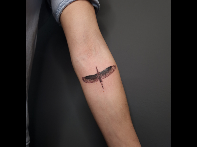 micro realisme tattoo kraanvogel