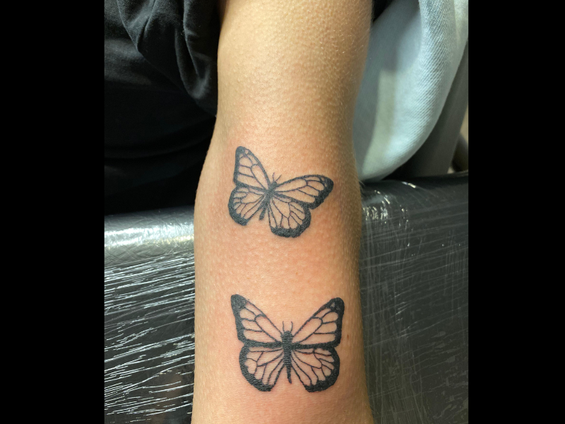 vlinder tattoo blackwork