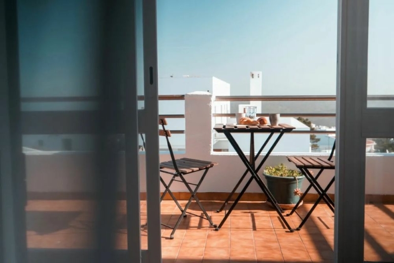 Breakfast on terrace at SURFinn Algarve in Portugal