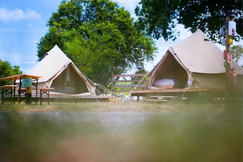 Familycamp Messanges campsite surrounded by trees in France