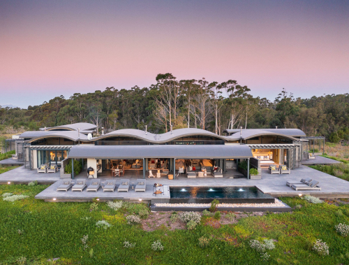 perivoli_lagoon_house_sunset_aerial_view.