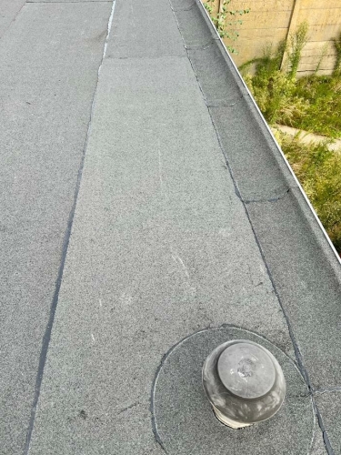 Bitumen dakbedekking leggen plat dak