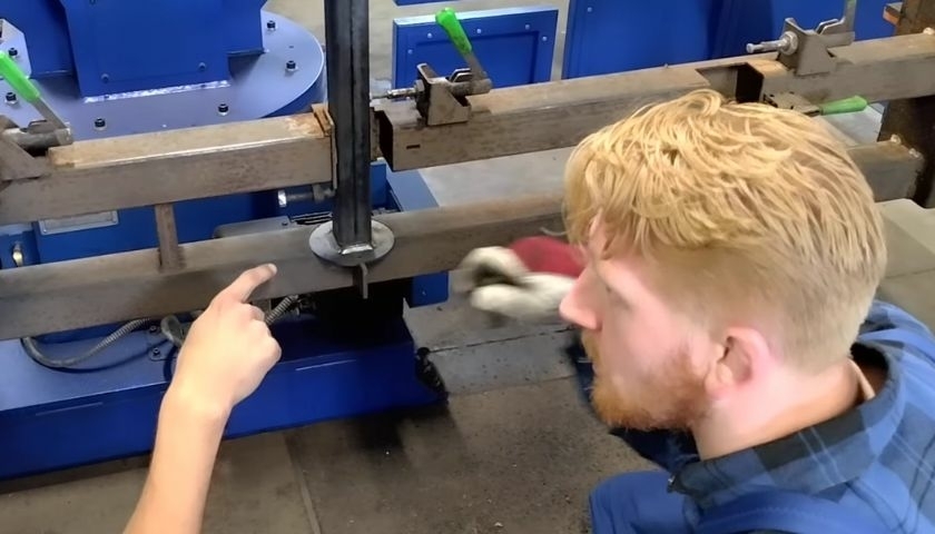 “Job from Van Oirschot at robot welding machine mold during visit to certified metal production partner abroad”