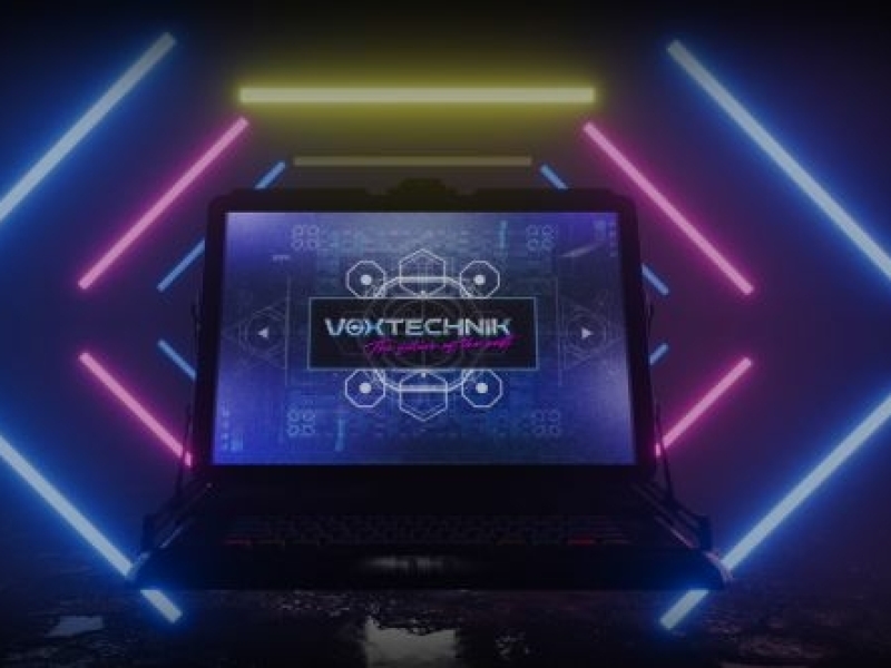 VoxTechnik visual computer screen with 80s neon Visual representation of iconic 80s synth-pop of VoxTechnik live show with computer screen with logo surrounded by 80s neon lights